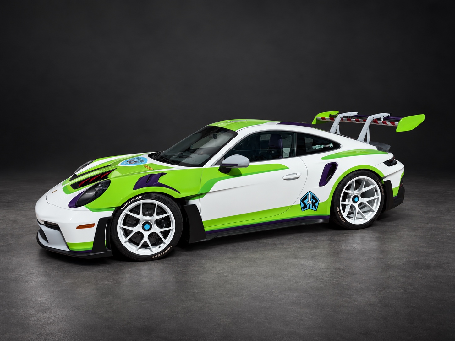 Buzz-inspired white Porsche 911 GT3 RS with green and purple accents