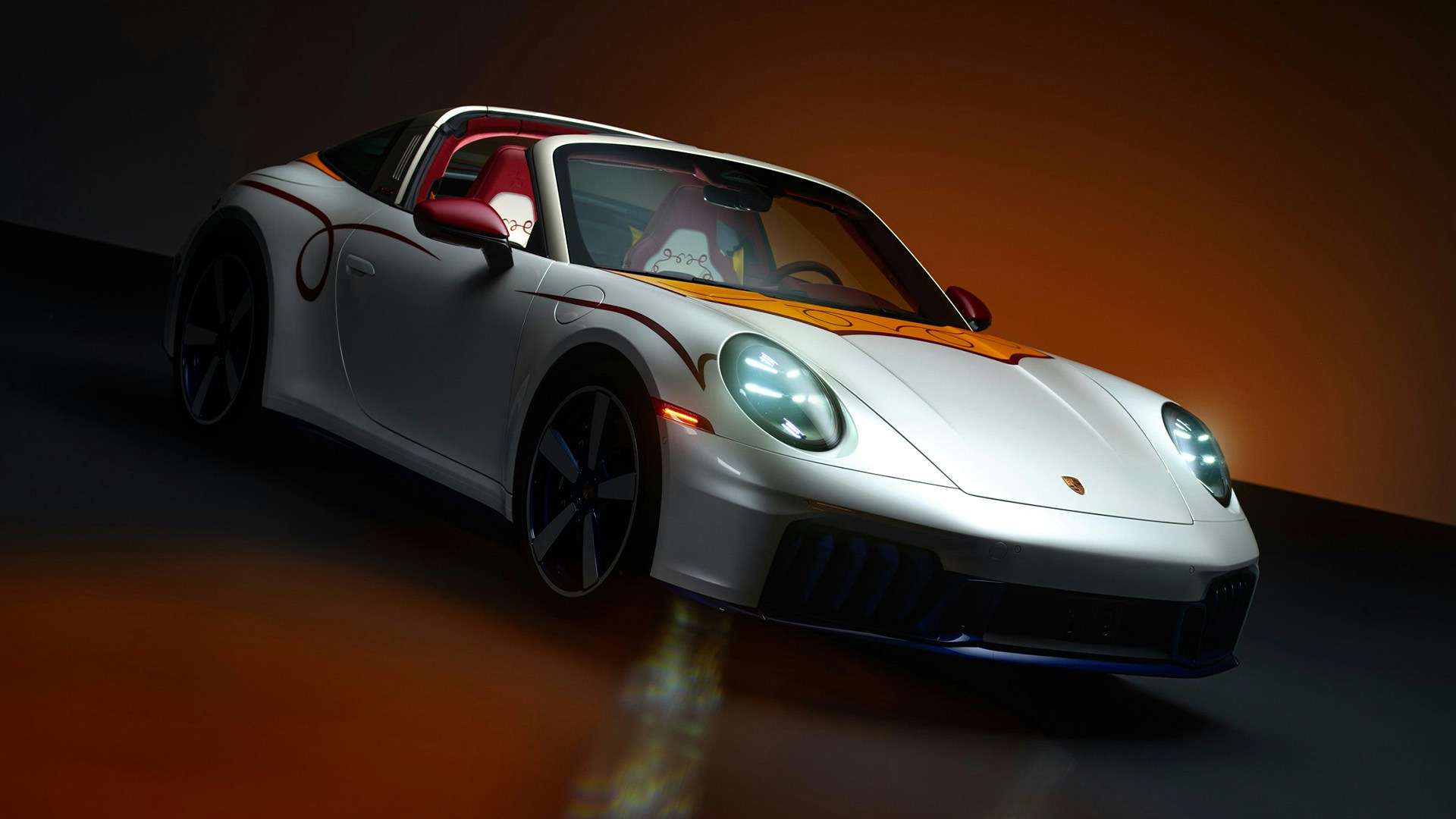 Jessie-inspired pearl-white Porsche 911 Targa with red interior and yellow graphics
